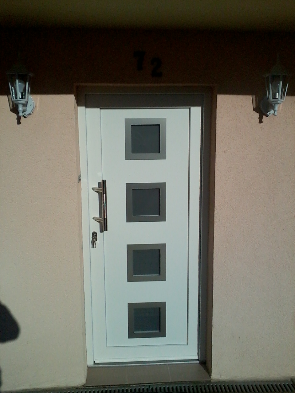 Porte d'entrée pvc + carré inox